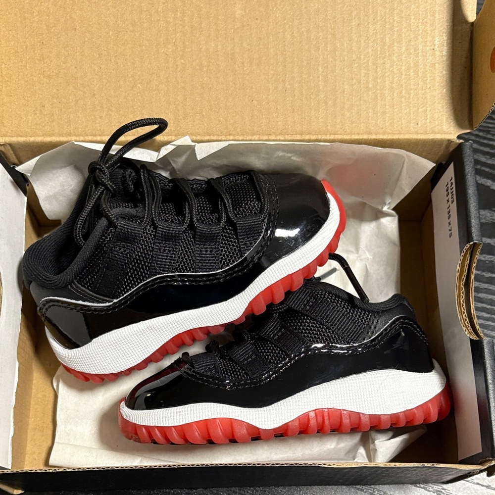 Jordan 11 Retros Low- Kids Black and Red Sneakers